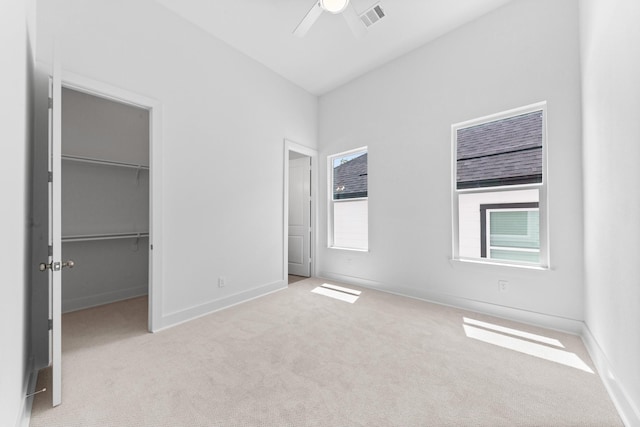 4710 Gunter St, Houston, TX 77020 - unfurnished bedroom with carpet floors, a spacious closet, baseboards, a ceiling fan, and a closet