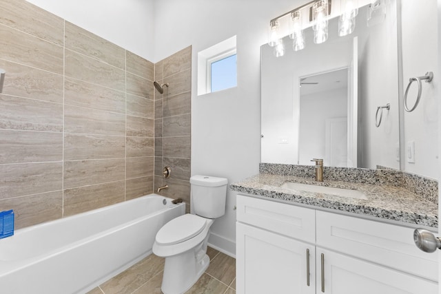 4710 Gunter St, Houston, TX 77020 - full bathroom with toilet, vanity, shower / bathtub combination, and baseboards