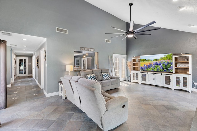20107 Sunny Shores Dr, Humble, TX 77346 - living room featuring baseboards, a ceiling fan, french doors, high vaulted ceiling, and recessed lighting