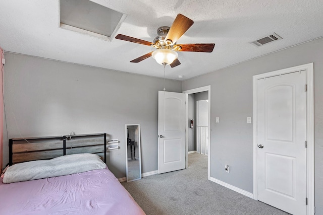 20107 Sunny Shores Dr, Humble, TX 77346 - carpeted bedroom with baseboards, a ceiling fan, and attic access