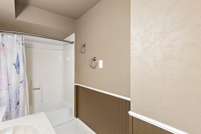20107 Sunny Shores Dr, Humble, TX 77346 - full bath featuring wainscoting, shower / tub combo, and tile patterned floors
