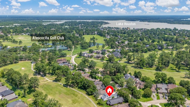 20107 Sunny Shores Dr, Humble, TX 77346 - aerial view of property and surrounding area with a large body of water and nearby suburban area