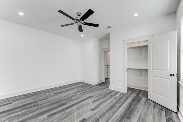 337 Todd St, Tomball, TX 77375 - unfurnished bedroom with wood finished floors, recessed lighting, a closet, baseboards, and a ceiling fan