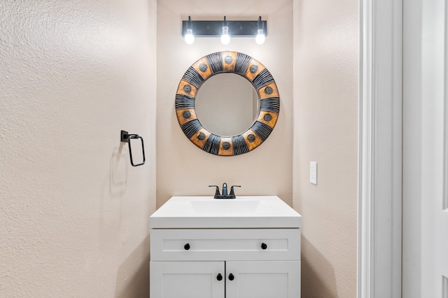 11902 Miramar Shores Dr, Houston, TX 77065 - bathroom featuring vanity and a textured wall