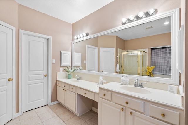 11902 Miramar Shores Dr, Houston, TX 77065 - bathroom featuring double vanity, a shower stall, tile patterned flooring, and baseboards