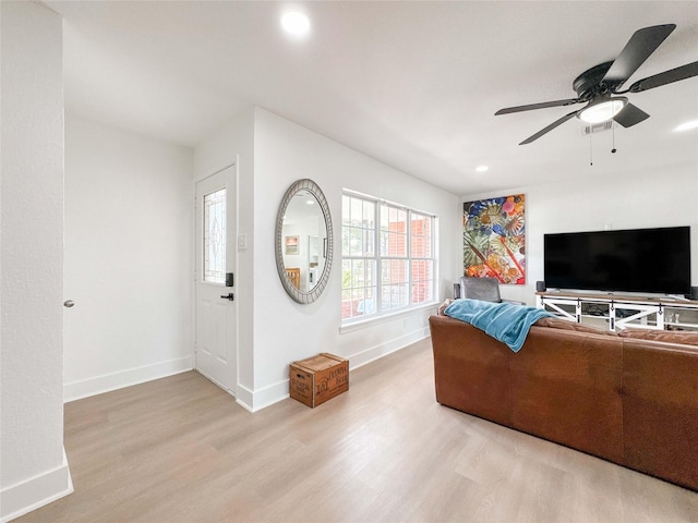 2302 Hewitt Dr, Houston, TX 77018 - living area with wood finished floors, baseboards, a ceiling fan, and recessed lighting