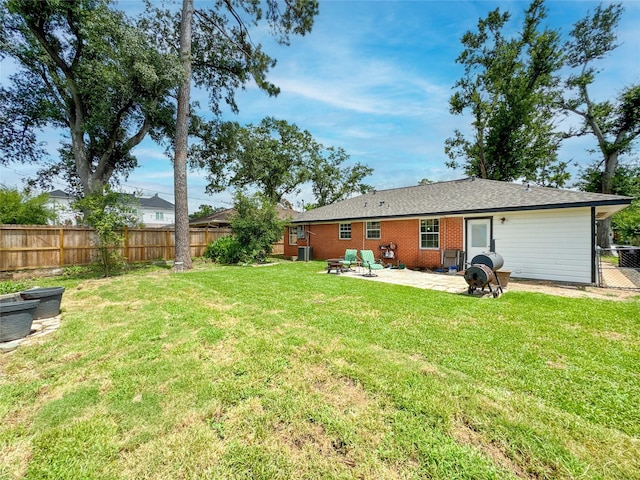 2302 Hewitt Dr, Houston, TX 77018 - rear view of property featuring a patio and brick siding