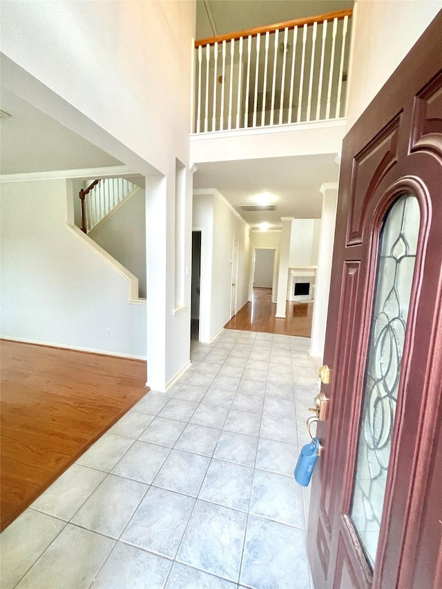 2534 Honeysuckle Walk, Spring, TX 77388 - tiled entryway featuring a towering ceiling and crown molding