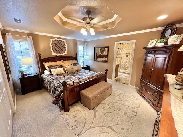 728 S Remington Dr, Angleton, TX 77515 - bedroom featuring light colored carpet, crown molding, a tray ceiling, a ceiling fan, and baseboards