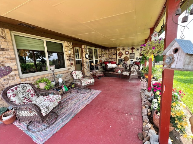 728 S Remington Dr, Angleton, TX 77515 - view of patio / terrace featuring an outdoor hangout area and an outbuilding