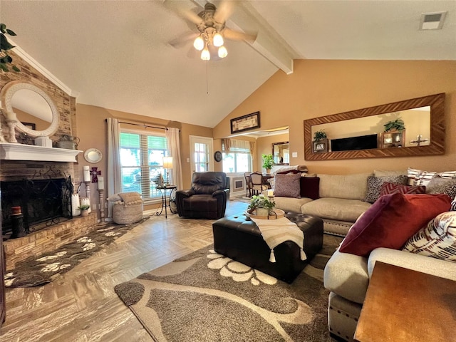 728 S Remington Dr, Angleton, TX 77515 - living room featuring ceiling fan, beamed ceiling, a fireplace, and high vaulted ceiling