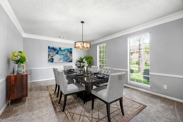 24714 Valleylight Dr, Katy, TX 77494 - carpeted dining area featuring a textured ceiling, crown molding, a chandelier, plenty of natural light, and baseboards