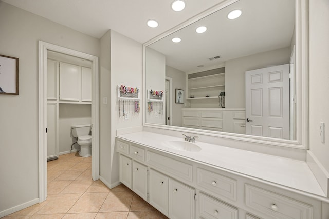 24714 Valleylight Dr, Katy, TX 77494 - bathroom featuring tile patterned floors, vanity, toilet, recessed lighting, and baseboards