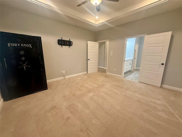 535 Longhorn Trl, Angleton, TX 77515 - unfurnished bedroom featuring carpet, a raised ceiling, baseboards, and ensuite bathroom