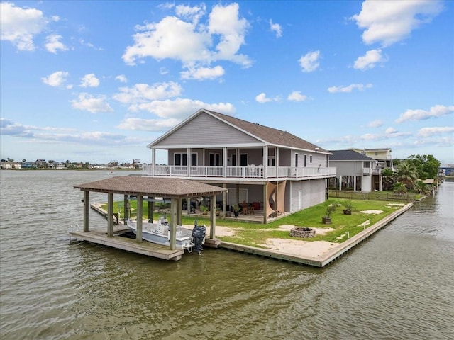 7014 Terrasso Dr, Hitchcock, TX 77563 - dock area with a fire pit and a deck with water view
