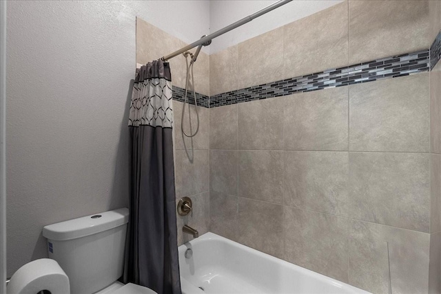 7014 Terrasso Dr, Hitchcock, TX 77563 - full bathroom with toilet, shower / tub combo, and a textured wall
