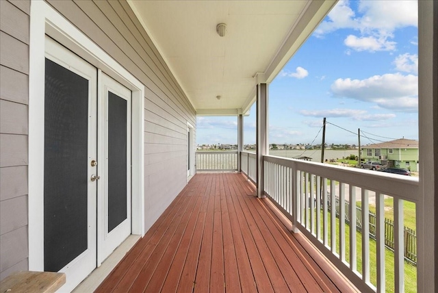 7014 Terrasso Dr, Hitchcock, TX 77563 - wooden deck with french doors