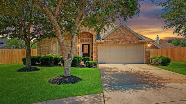 3502 Barrington Ct, Pearland, TX 77584 - traditional-style home with a garage, concrete driveway, and brick siding