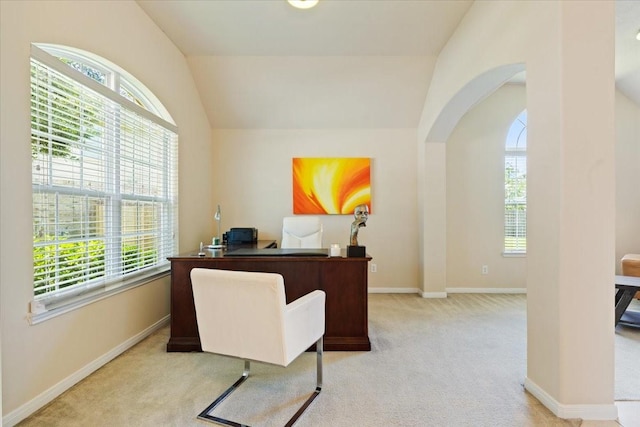 3502 Barrington Ct, Pearland, TX 77584 - carpeted home office with arched walkways, plenty of natural light, vaulted ceiling, and baseboards