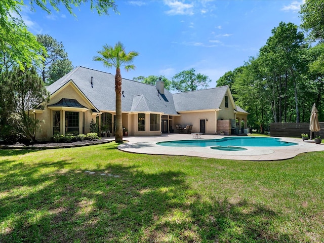 9819 Crestwater Cir, Magnolia, TX 77354 - swimming pool with a lawn and a patio area