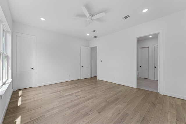 1316 E 34th St, Houston, TX 77022 - empty room with light wood-type flooring, ceiling fan, recessed lighting, and baseboards