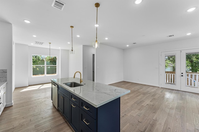 1316 E 34th St, Houston, TX 77022 - kitchen featuring a sink, dishwasher, plenty of natural light, light wood-type flooring, and recessed lighting