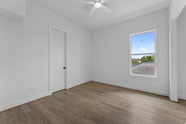 1316 E 34th St, Houston, TX 77022 - unfurnished room featuring ceiling fan, wood-type flooring, and baseboards