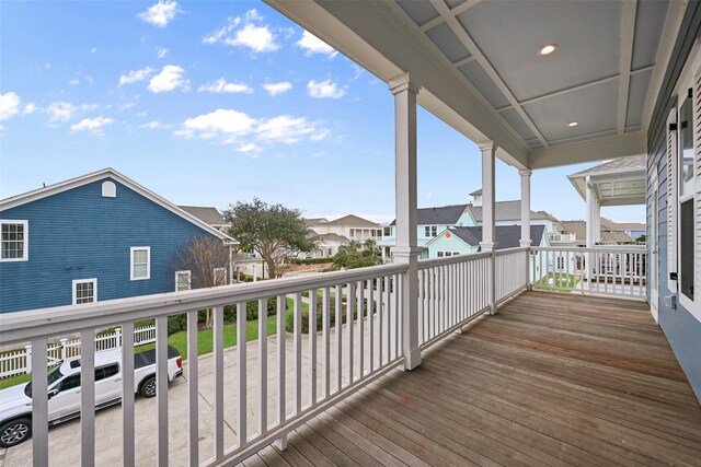 11 Caravelle Ct, Galveston, TX 77554 - wooden deck featuring a residential view