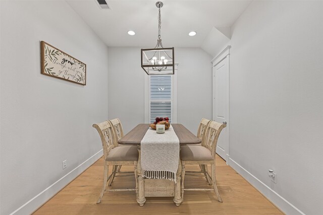 11 Caravelle Ct, Galveston, TX 77554 - dining space with a chandelier, baseboards, light wood-style floors, and recessed lighting