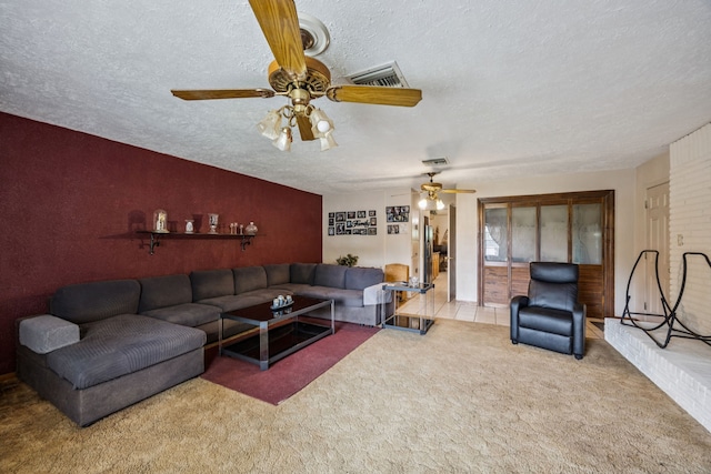 16219 Dundee Rd, Cypress, TX 77429 - carpeted living room with a ceiling fan and a textured ceiling