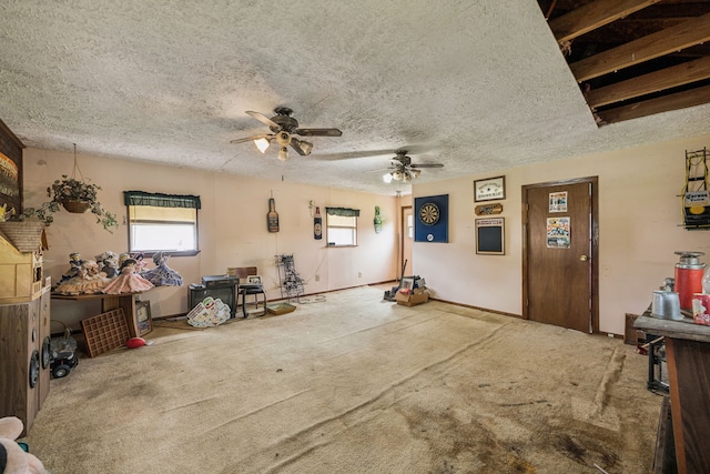 16219 Dundee Rd, Cypress, TX 77429 - interior space featuring a ceiling fan and a textured ceiling