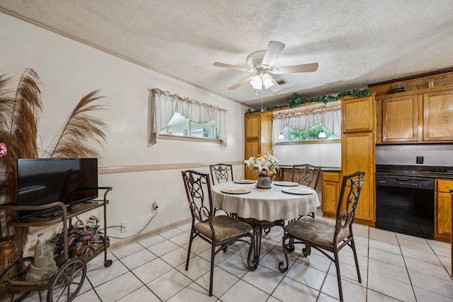 16219 Dundee Rd, Cypress, TX 77429 - dining space featuring a ceiling fan, a textured ceiling, and light tile patterned flooring