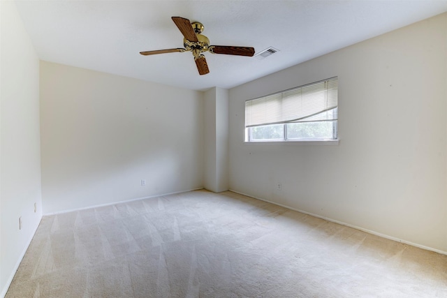 5638 Long Creek Ln, Houston, TX 77088 - empty room with carpet floors, a ceiling fan, and baseboards