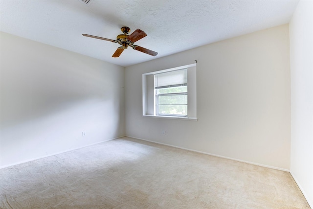 5638 Long Creek Ln, Houston, TX 77088 - carpeted spare room with a ceiling fan and baseboards