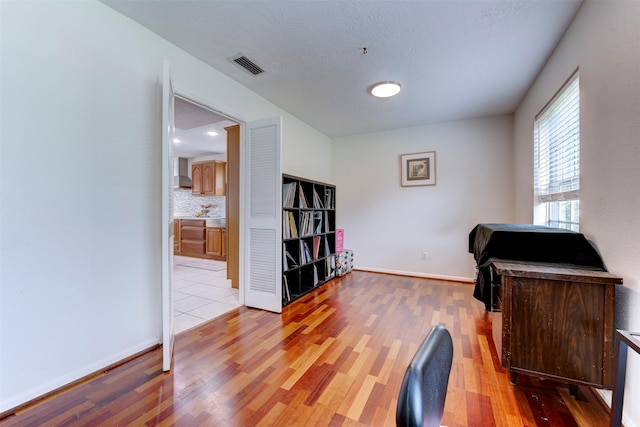5638 Long Creek Ln, Houston, TX 77088 - office with light wood-style floors and baseboards