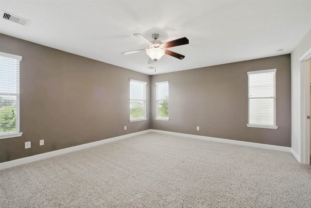 11707 Newel Elm St, Houston, TX 77038 - carpeted spare room with ceiling fan and baseboards