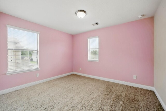 11707 Newel Elm St, Houston, TX 77038 - carpeted spare room featuring baseboards and a smoke detector