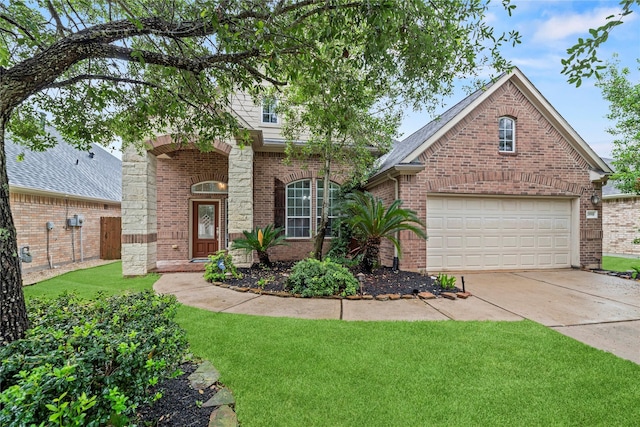 20918 Field Manor Ln, Katy, TX 77450 - traditional home with concrete driveway, brick siding, and a front yard