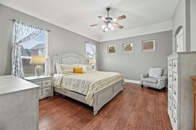 20918 Field Manor Ln, Katy, TX 77450 - bedroom featuring dark wood-style flooring, ceiling fan, and baseboards