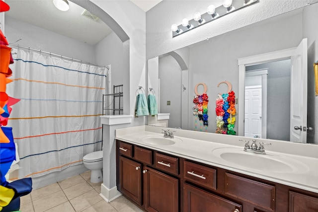 20918 Field Manor Ln, Katy, TX 77450 - full bathroom with tile patterned flooring, double vanity, and toilet