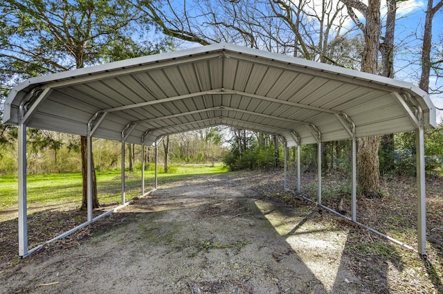 472 E Main St, Zavalla, TX 75980 - view of car parking with a detached carport
