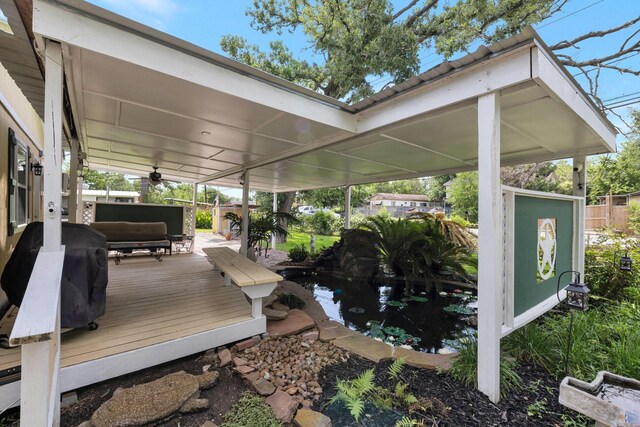 639 Manor St, Houston, TX 77015 - wooden terrace with a garden pond, a ceiling fan, and grilling area