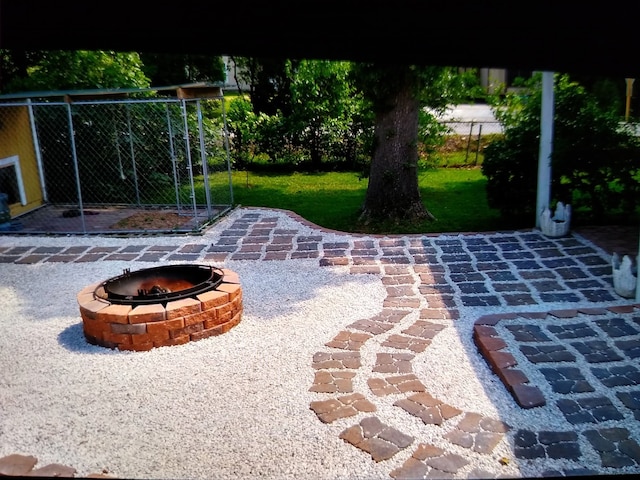 639 Manor St, Houston, TX 77015 - view of patio / terrace with an outdoor fire pit