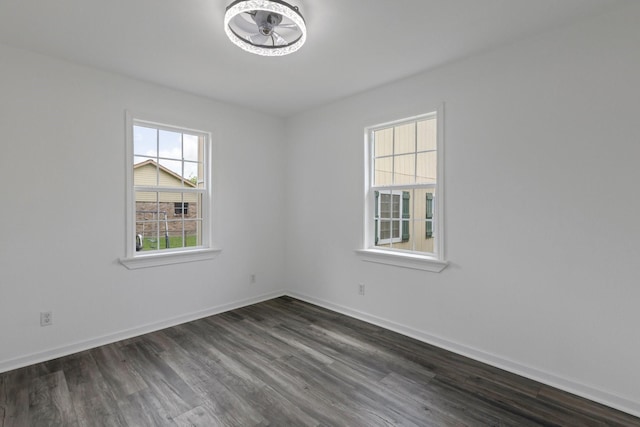639 Manor St, Houston, TX 77015 - spare room featuring dark wood-style flooring and baseboards