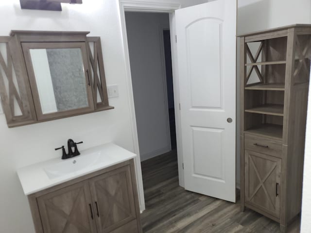 639 Manor St, Houston, TX 77015 - bathroom with vanity and wood finished floors