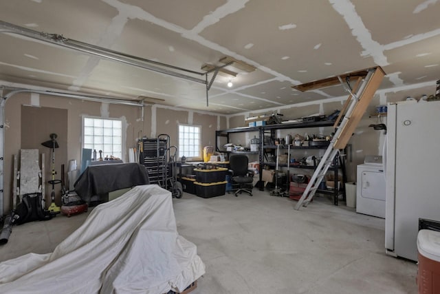 639 Manor St, Houston, TX 77015 - garage with freestanding refrigerator and washer / dryer