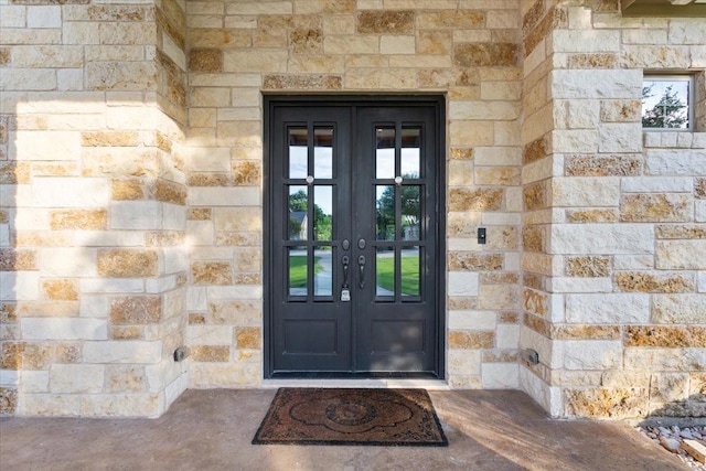 535 Creekside Dr, Salado, TX 76571 - view of exterior entry featuring french doors and stone siding