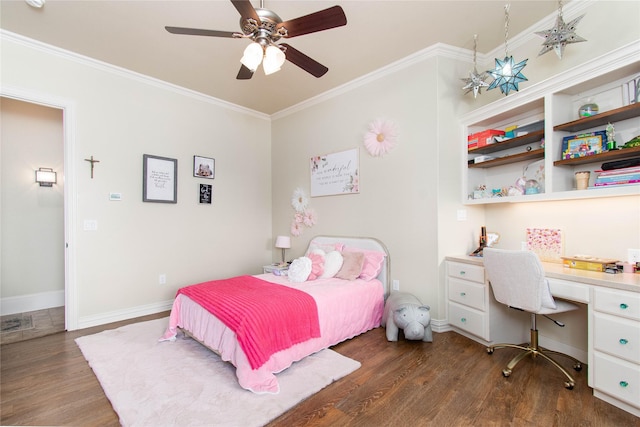 535 Creekside Dr, Salado, TX 76571 - bedroom with dark wood-type flooring, crown molding, ceiling fan, and baseboards