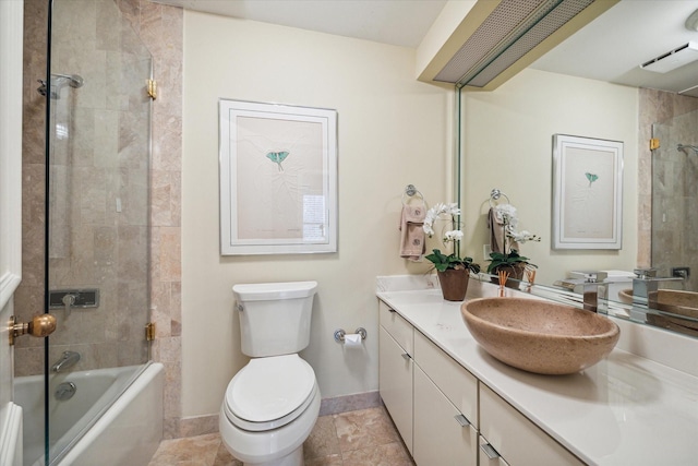 101 Westcott St Unit 305, Houston, TX 77007 - full bath featuring vanity, toilet, shower / bath combination, baseboards, and tile patterned flooring