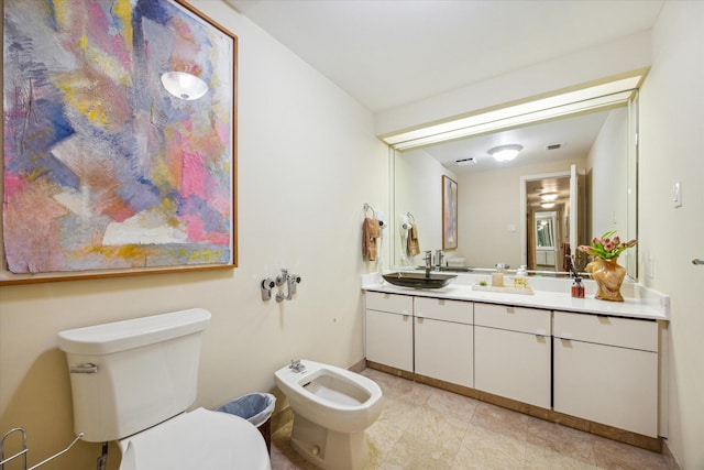 101 Westcott St Unit 305, Houston, TX 77007 - bathroom featuring toilet, vanity, and a bidet